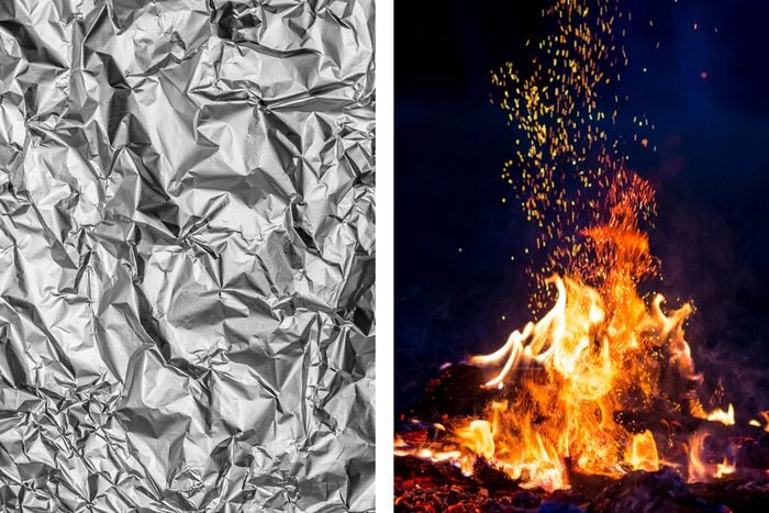 Aluminum foil texture next to campfire with open flames