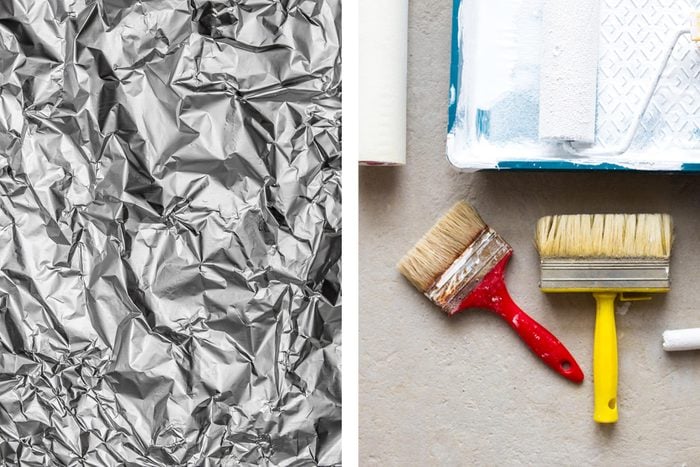 Aluminum foil texture next to paintbrushes