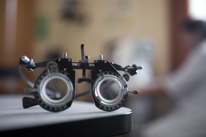 Close up of a phoropter inside the optical, ophthalmologist in a blurred background. tool for ophthalmologists