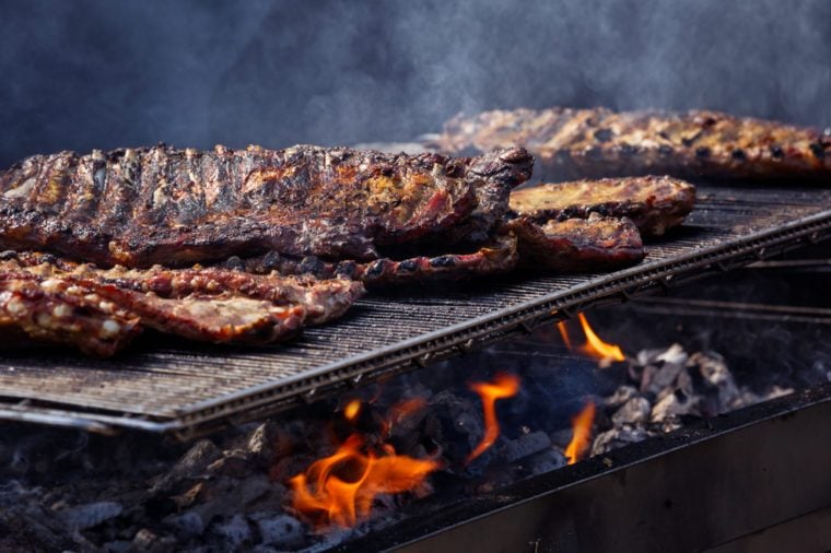 Beef Ribs Cooking on Barbecue Grill at a Local Community Event