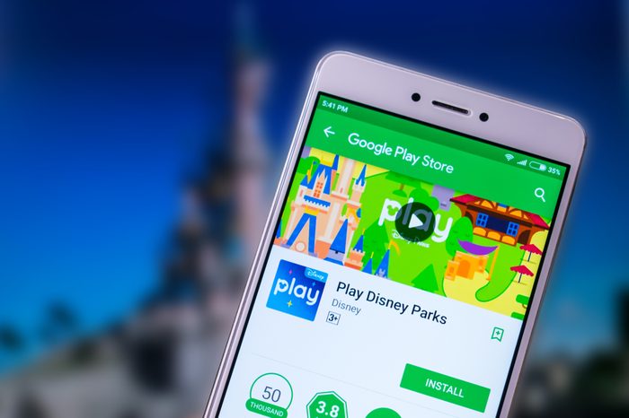 KROPIVNITSKIY, UKRAINE – 8 JULY, 2018: Play Disney Parks new mobile app on smartphone screen. Disneyland Releases New App for Disney Theme Parks