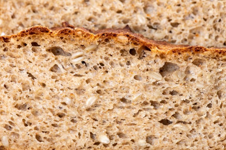 whole grain or whole wheat bread, slices of homemade bread. close up of bread