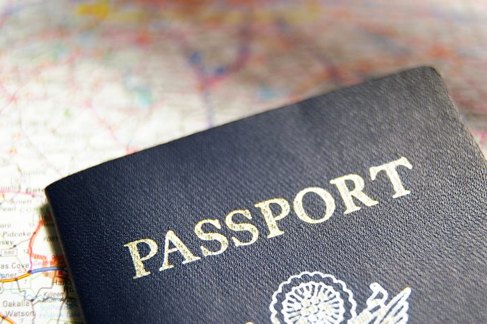 closeup of a US passport on a map