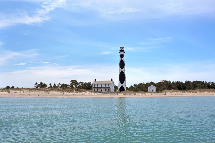 Cape Lookout Lighthouse on the Southern Outer Banks or Crystal Coast of North Carolina viewed from the water