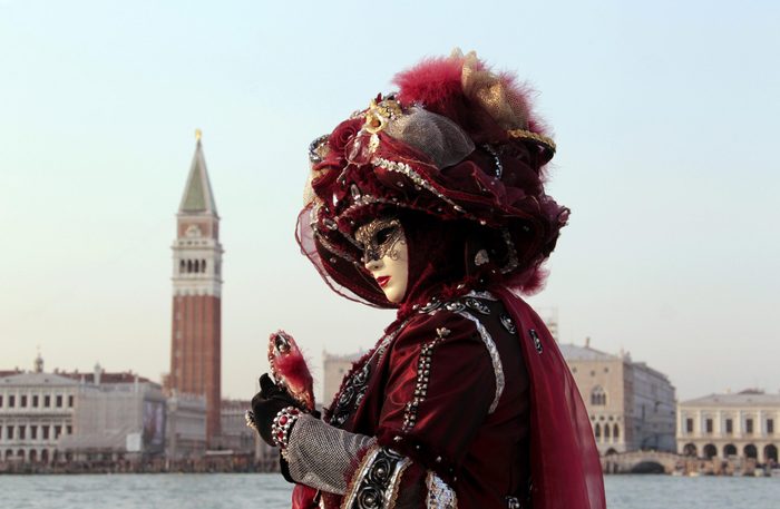 VARIOUS Woman wearing a mask, Carnival in Venice, San Giorgio Maggiore, Venice, Veneto, Italy