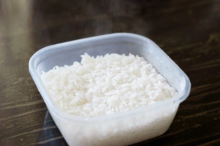 Close Up In Plastic Pot With White Rice