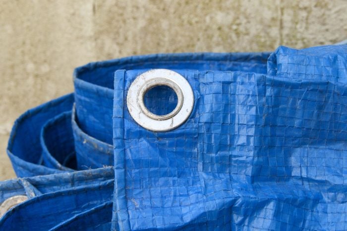 blue tarpaulin with eyelet