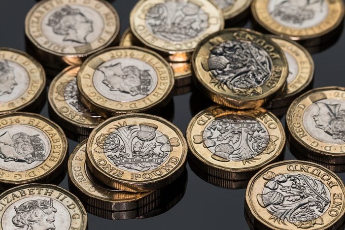 New British Pound Coins (on black)