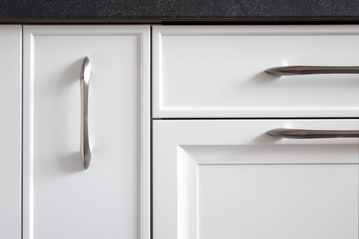 Kitchen cabinets with classic traditional fronts, close-up.