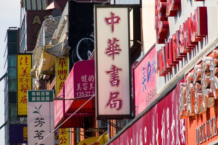 Flushing, NY, USA - October 11, 2010: facade with colorful shop signs in Chinese or Korean writing