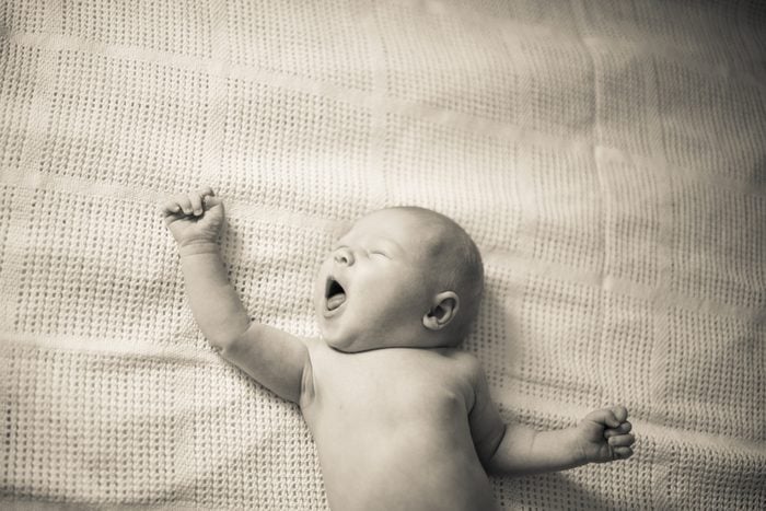 close up. portrait of a yawning newborn baby.