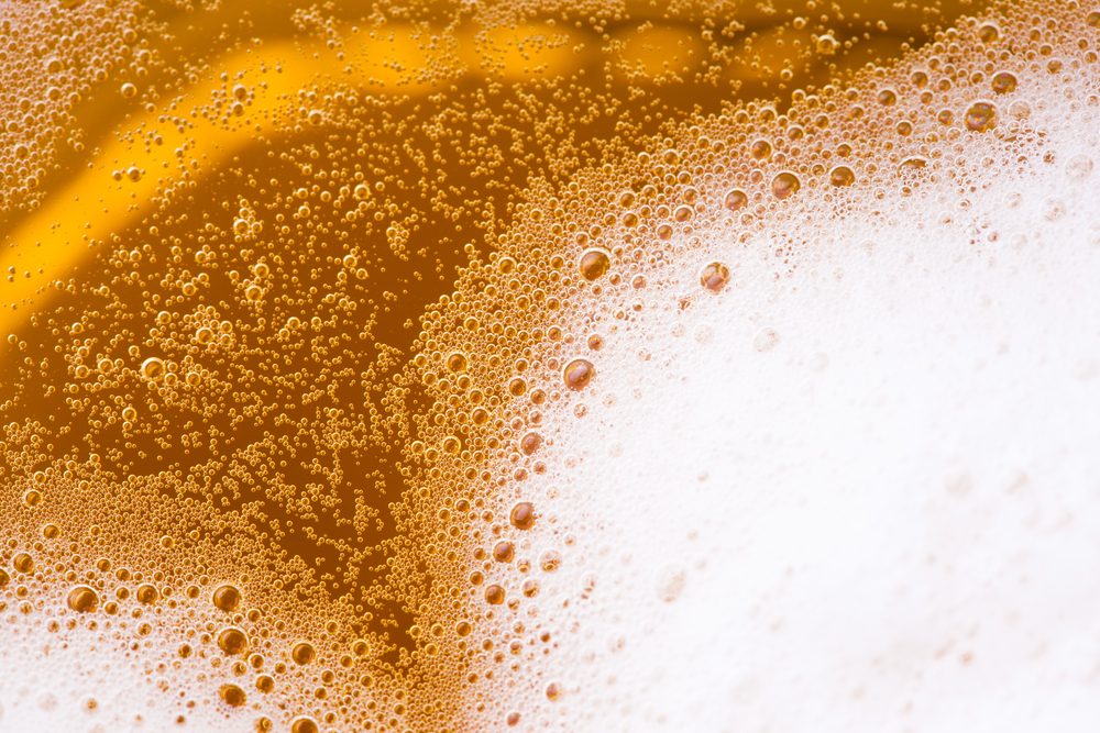 close up of beer with foam