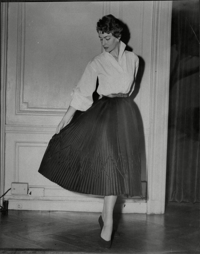 Fashion Women 1953 Model Wearing Various Street Fashions.