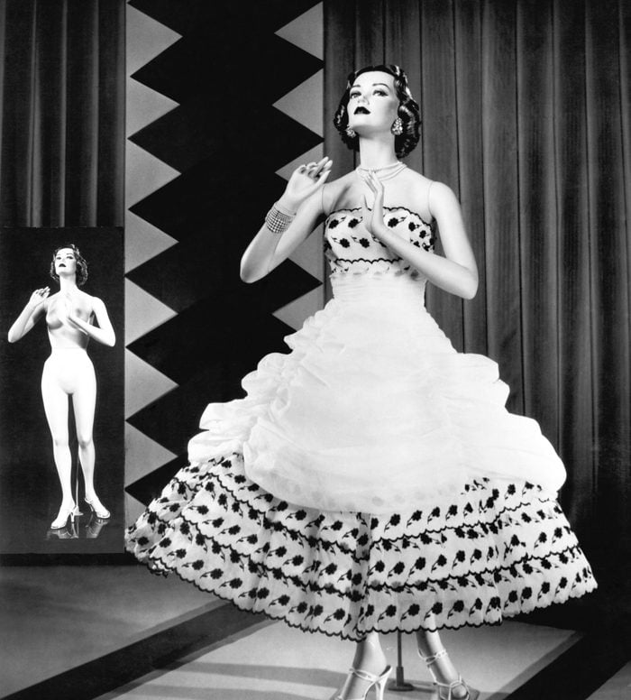 VARIOUS c. 1950 A fashionable mannequin and her unclothed version in the background.