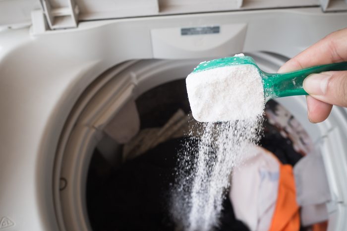 Pour detergent into washing machine