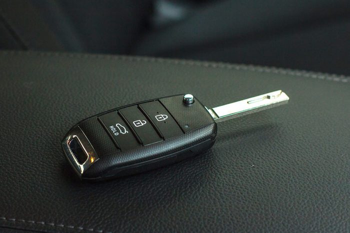Modern Car remote control key in vehicle interior