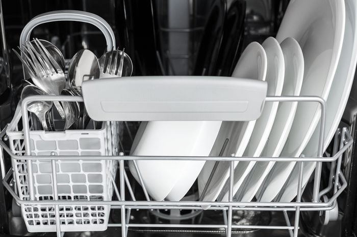 clean dishes inside the dishwasher after washing
