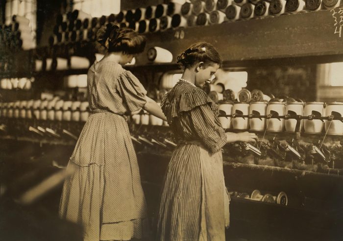 VARIOUS Two Young Girls at Spoolers, Lincoln Cotton Mills, Evansville, Indiana, USA, Lewis Hine for National Child Labor Committee, October 1908