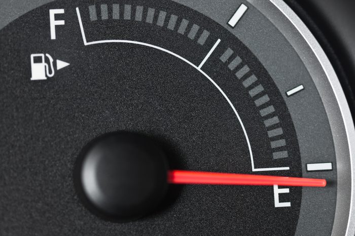 Fuel gauge with needle pointing to empty