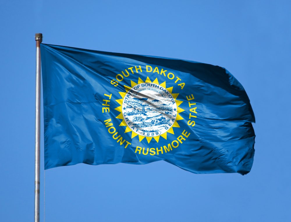National flag State of South Dakota on a flagpole