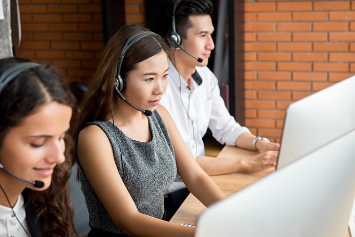 Multiethnic telemarketing customer service agent team, call center job concept