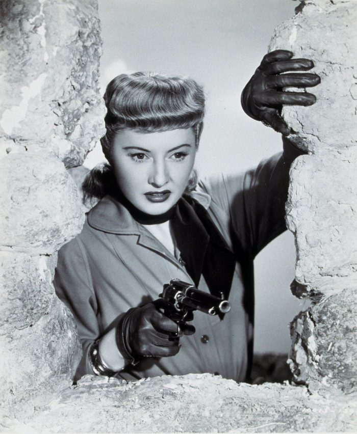 VARIOUS FILM STILLS OF 'FURIES' WITH 1950, ACTION, GUN CRAZY, HAND GUN, BARBARA STANWYCK, WEAPONS, WESTERN, BULL NOSE, WINDOW, WOMEN (EVIL/MEAN/DANGEROUS), FEMME FATALE, GUN, GLOVES, LEATHER GLOVES, ANGRY IN 1950