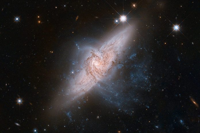 Hubble View Of Overlapping Galaxies