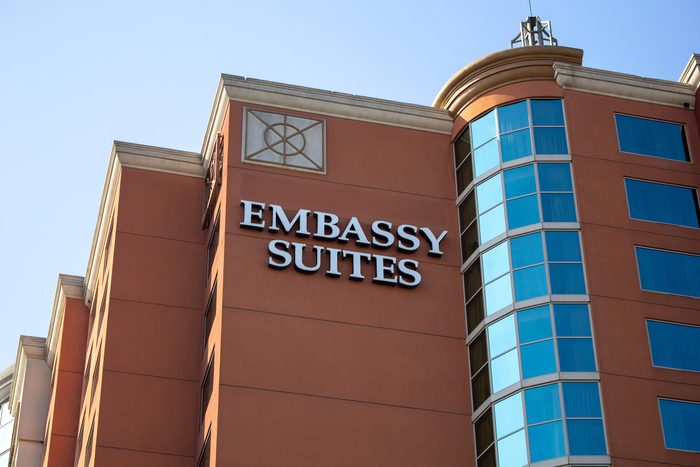 Anaheim, California/United States - 03/25/19: A building front sign for the hotel known as Embassy Suites