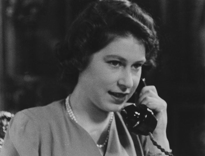 Art (Portraits) - various Princess Elizabeth 1926- at her desk answering telephone greetings on her 18th birthday, 21 April 1944