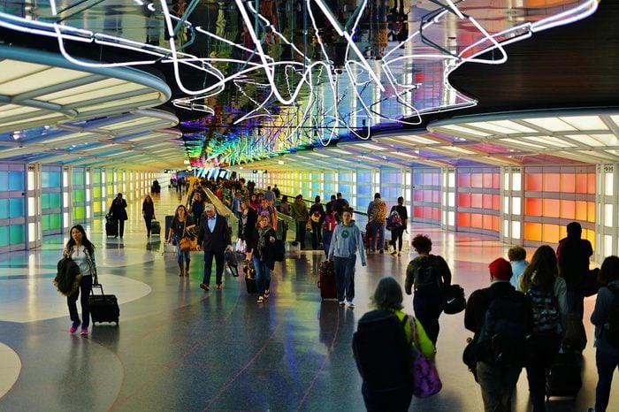 CHICAGO, IL -7 APR 2017- The colored electric neon tunnel The Sky Is the Limit at Chicago O'Hare International Airport (ORD) connects the B and C concourses at the United Airlines (UA) terminal.