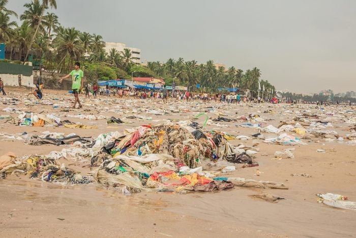 MUMBAI, INDIA - JUNE 25, 2017: The Juhu Beach in Mumbai which is filled with garbage and waste and is heavily poluted