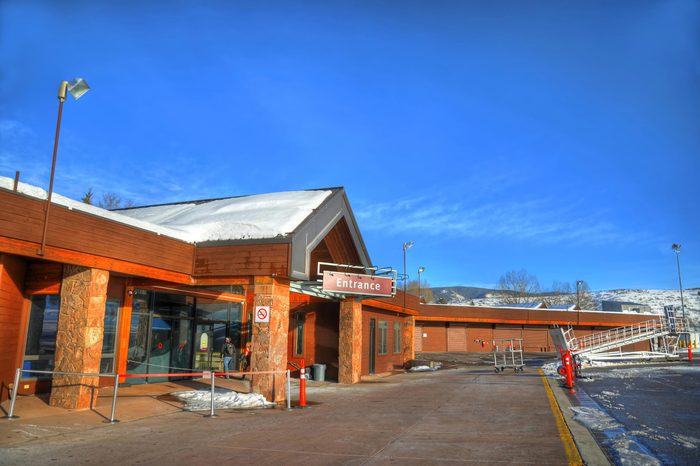 The entrance to Aspen-Pitkin County Airport (ASE) on a clear blue sky (HDR image)