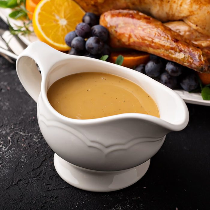 Homemade gravy in a sauce dish with turkey for Thanksgiving or Christmas