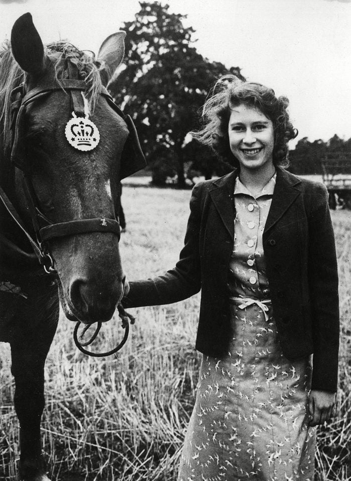 Historical Collection 173 Queen Elizabeth Ii When Princess Elizabeth Pictured with One of the Horses During Harvest Time at Sandringham Norfolk in 1943 1943