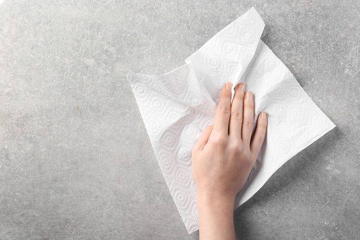 wipe counter hand paper towel