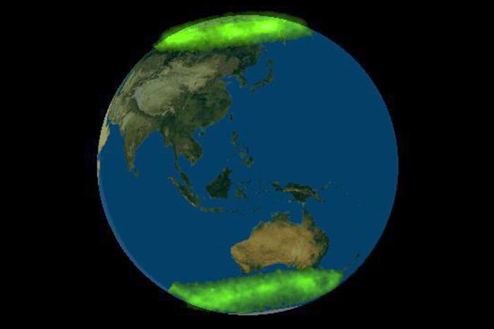 FIRST PHOTOGRAPH OF THE EARTH SHOWING BOTH AURORAS