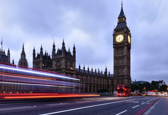 Time lapse view of bus passing Houses of Parliament