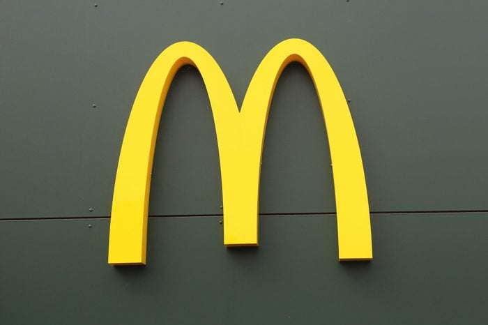AMSTERDAM - OCTOBER 20: Mcdonalds Logo on the wall of the restaurant onOctober 20,2015