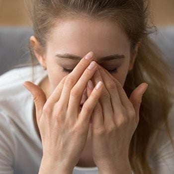 woman migraine headache pain