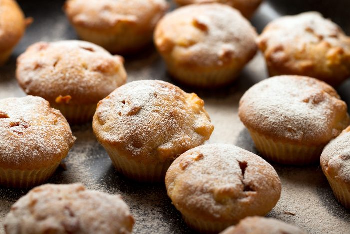 Mini Muffins on a black metal baking sheet