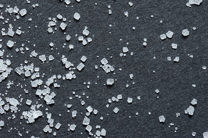 sugar crystals on black background macro