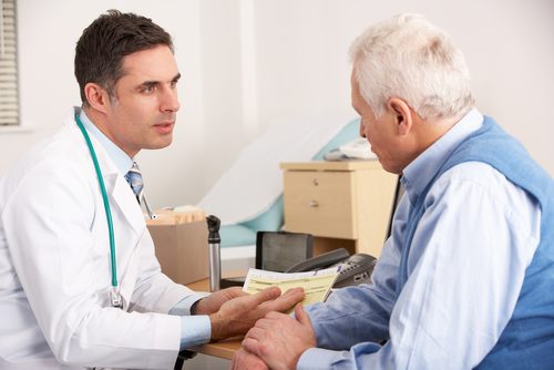 doctor and elderly patient