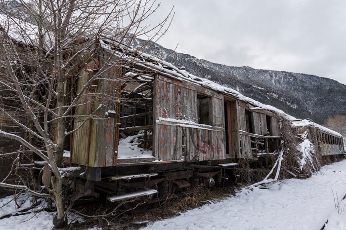 Abandoned old train station in Canfranc, in Spanish Pirineos mountain, near of the border of France. Photo taken in winter after a snowfall.
