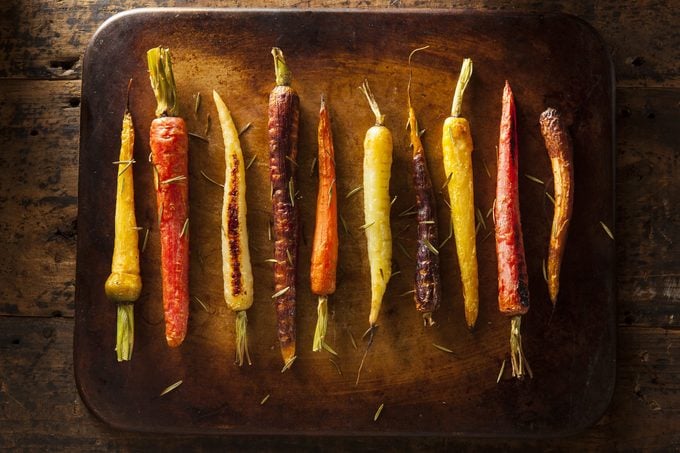 Colorful Multi Colored Roasted Carrots on a Background