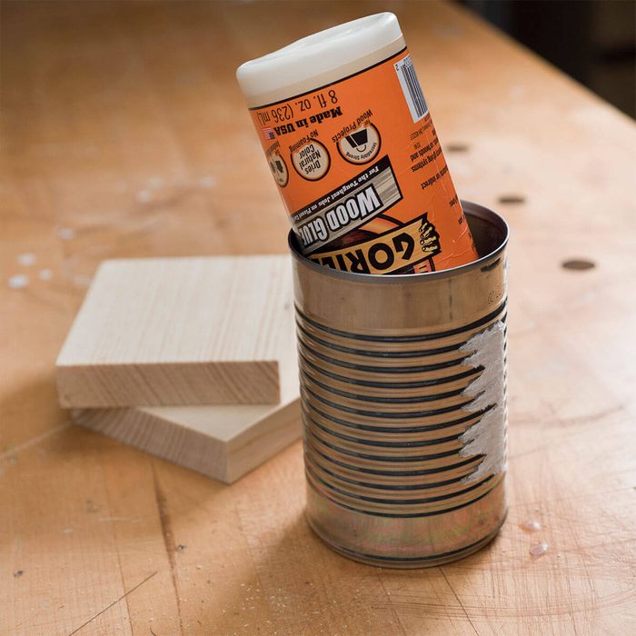 HH tin can for storing glue bottle upside-down