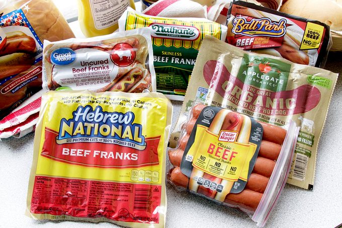 Multiple popular brands of hot dogs in packaging.