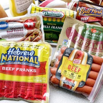 Multiple popular brands of hot dogs in packaging.