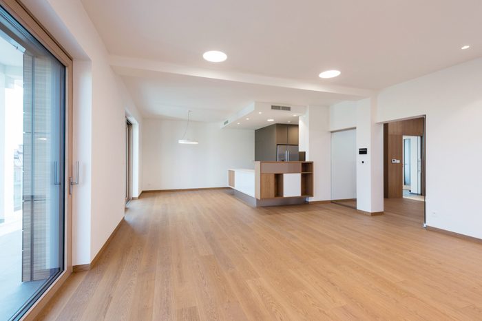 Contemporary interior of kitchen with empty room
