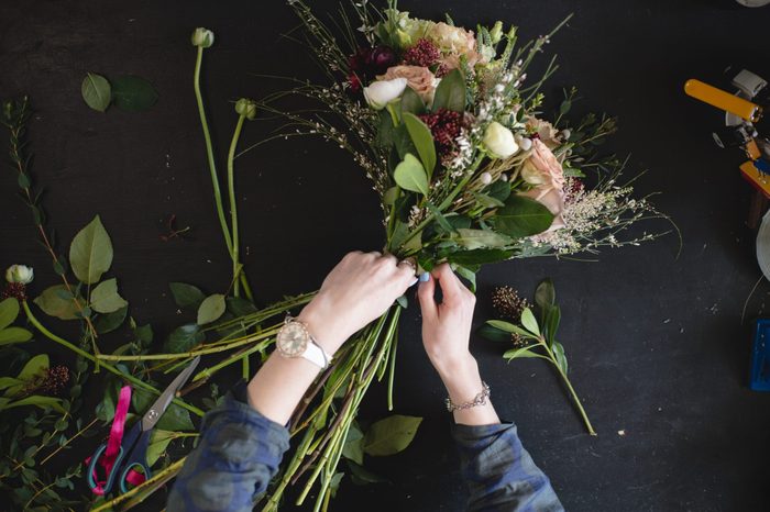 Tools and accessories florists need for making up a bouquet out of peonies