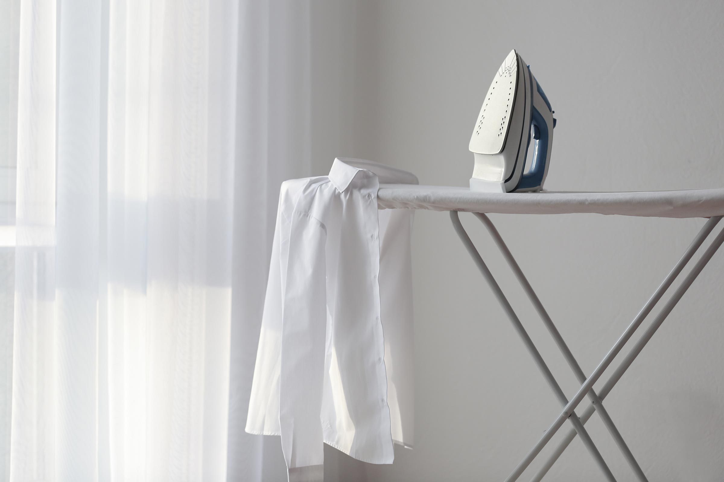 Is It Better To Steam Or Iron Your Clothes Reader S Digest